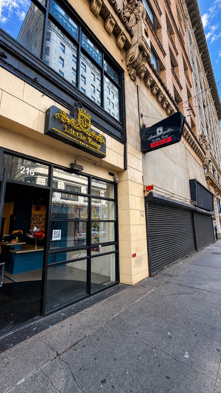 Street entrance of Little Easy Art Gallery at 216 W 5th Street
